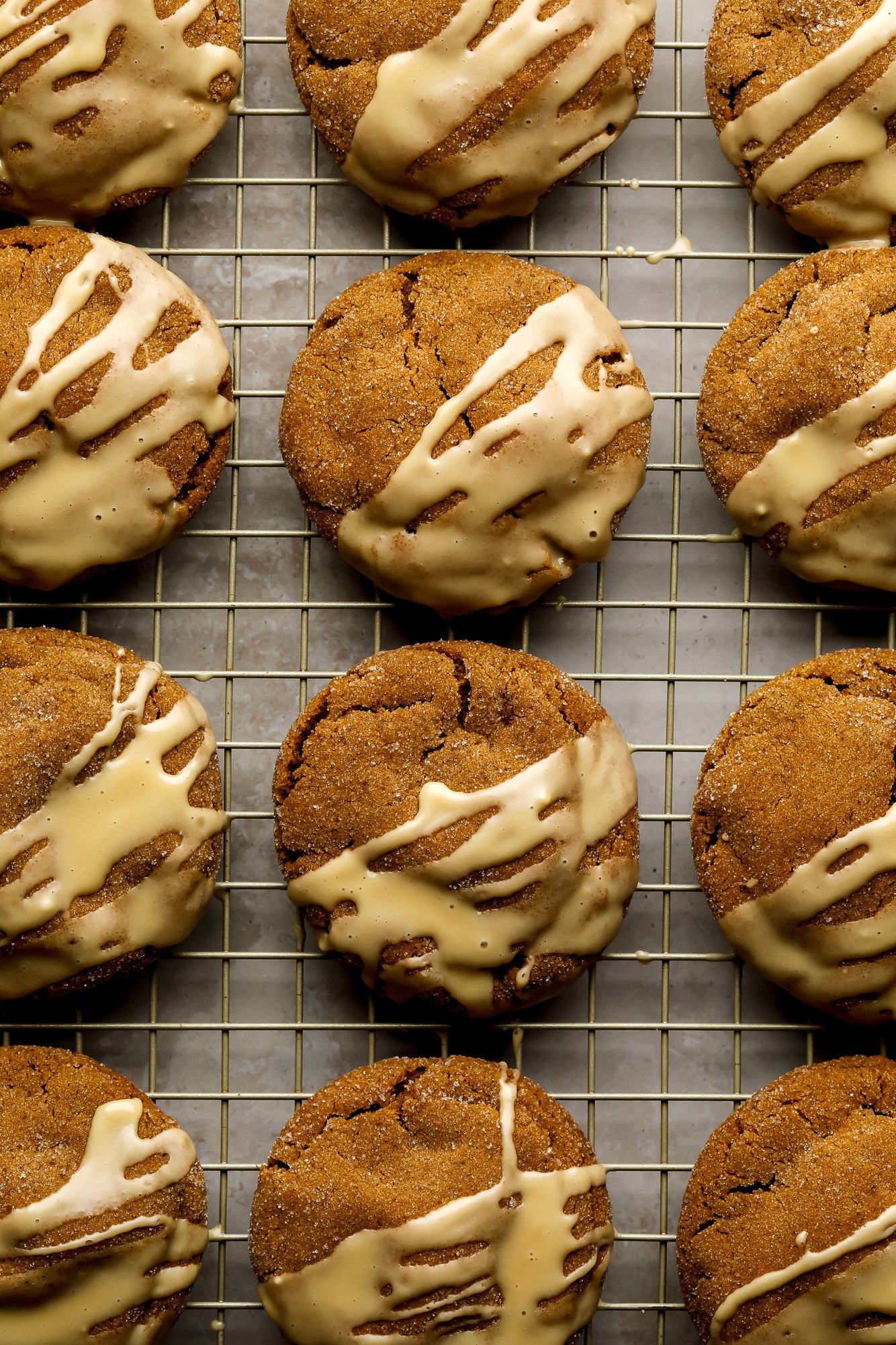 Ginger ice cookies were searched with a white squeezing enamel on a wire frame.
